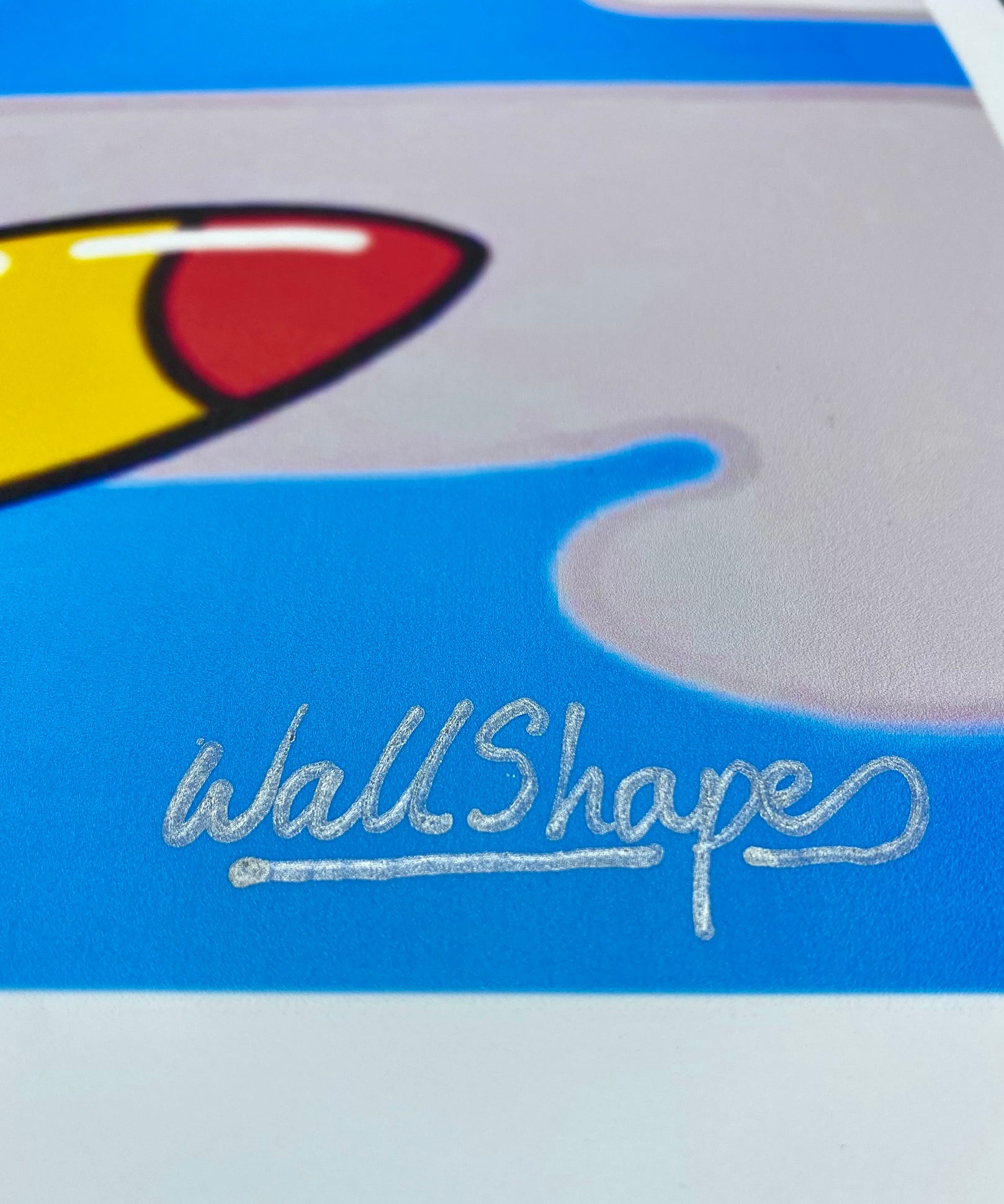 Launch WallShapes stencil signature detail.