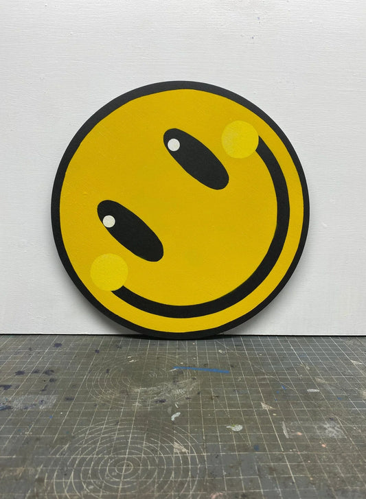 Handcrafted yellow smiley face spray-painted wall art by WallShapes, UK small art shop