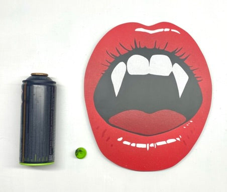 Hand made shaped spray-painting of red lips with vampire fangs on a white background size comparison with 400ml spray paint can.