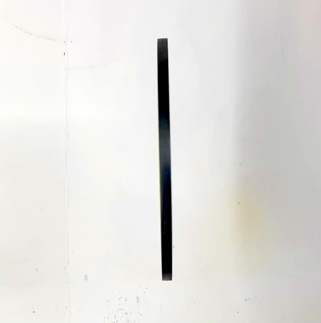 A video detailing a spray painted Smiley spinning to show all sides including the hanging hardware and signature of WallShapes. This video shows the wall art hanging from the alternate tilted hanging position.