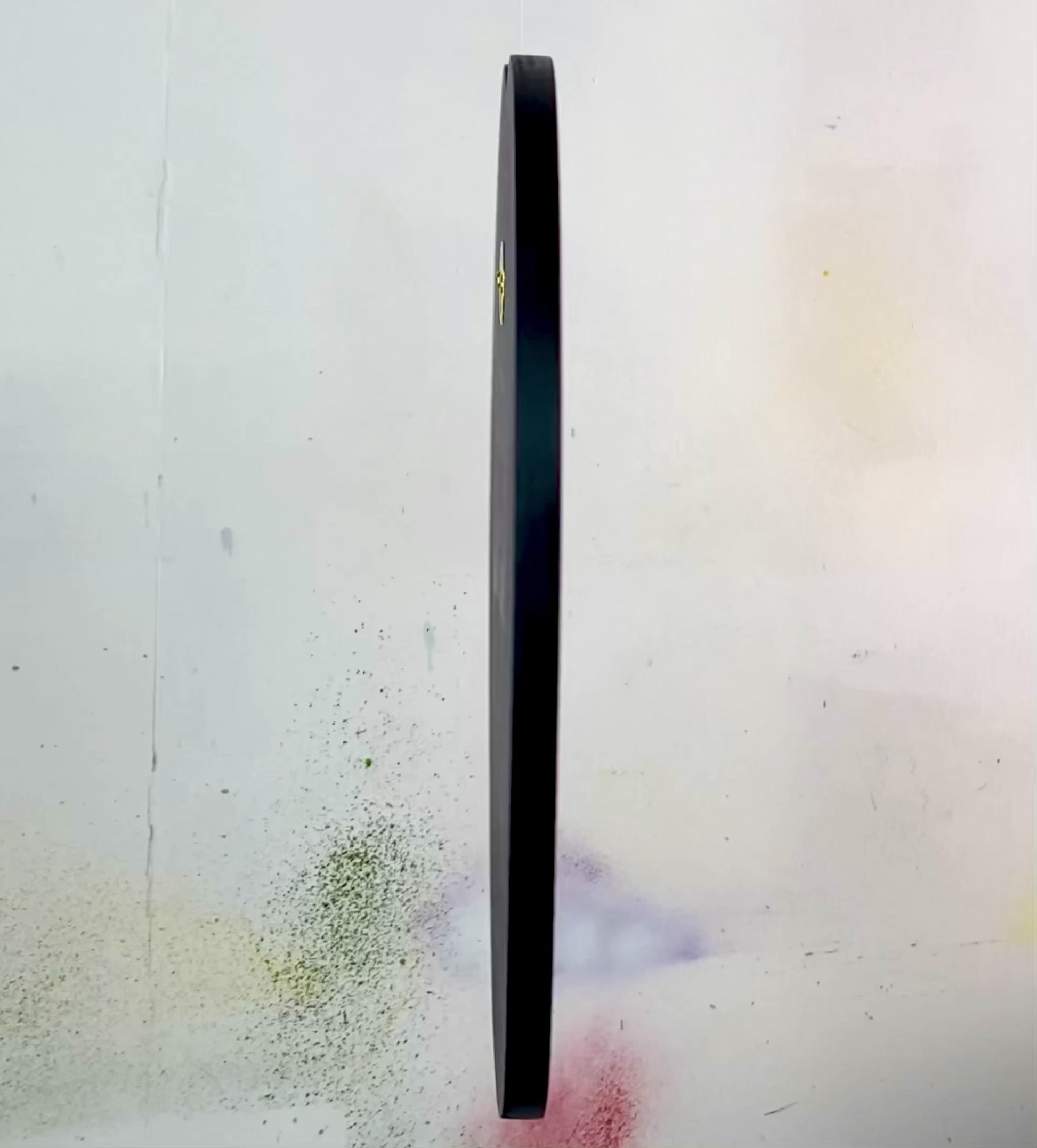 Video detailing a shaped spray painting called Vampires Kiss. Painting is spinning to show all sides including back hanging detail and WallShapes signature.