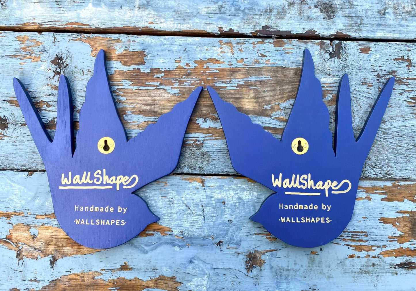 Rear details of Swallows spray paintings, showing hanging features and signatures of WallShapes.