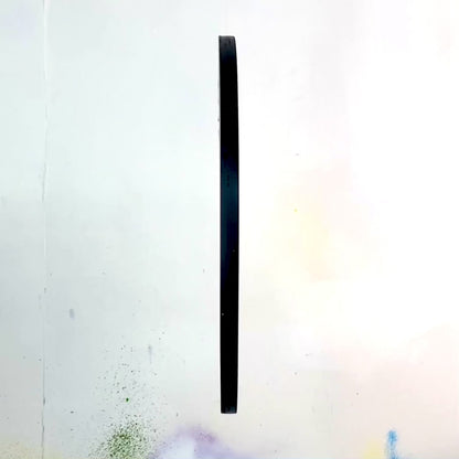 A video detailing a spray painted Smiley spinning to show all sides including the hanging hardware and signature of WallShapes. This video shows the wall art hanging from the main straight hanging position.
